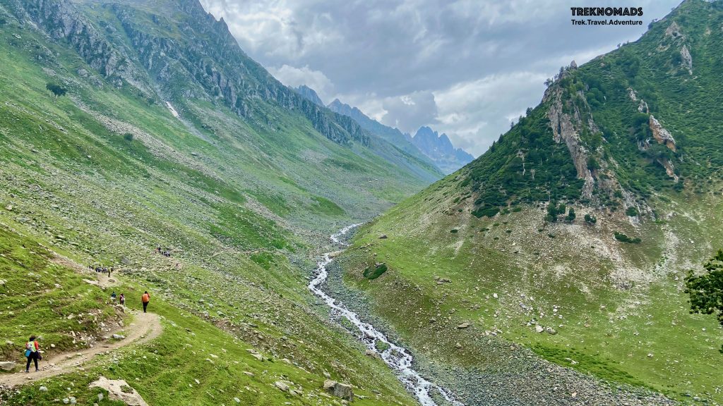 After crossing the tree-line, we reached Tabletop. We had hot Maggie, our packed lunch and started descending to this beautiful and expansive valley. We had to trek from another 6-7 kms to reach out camp 2. Kashmir Great Lakes Trek - Premium