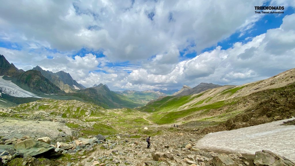 After crossing the Nichnai Pass, we came across the most beautiful trail while descending. The trail was "walk in the park". We walked on the soft grass almost the entire trail. Our camp was around 4-5 kms away near Vishansar lake from here. Kashmir Great Lakes Trek - Premium
