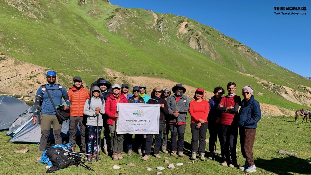 Group posing at Gadsar Campsite. We were ready to trek to Satsar lake and campsite. If lucky, we would also see the great Nanga Parbat - which is world's 9th highest mountain. - Kashmir Great Lakes Trek, Premium